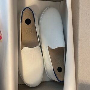 Rothy's White Slip-On Sneakers with Blue Trim